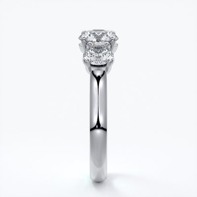 Dahlia Engagement ring straight trilogy round cathedral 18ct white gold