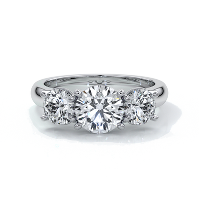 Platinum ring with a trilogy of round diamonds with a cathedral setting