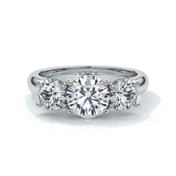 Platinum ring with a trilogy of round diamonds with a cathedral setting