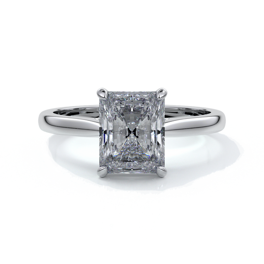 Ring with two carat radiant diamond held by four claws, enhanced with eighteen carat white gold tapered band