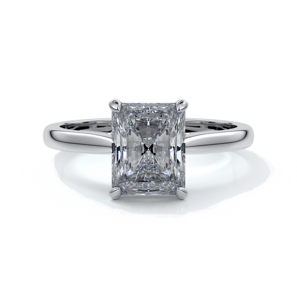 Ring with two carat radiant diamond held by four claws, enhanced with eighteen carat white gold tapered band