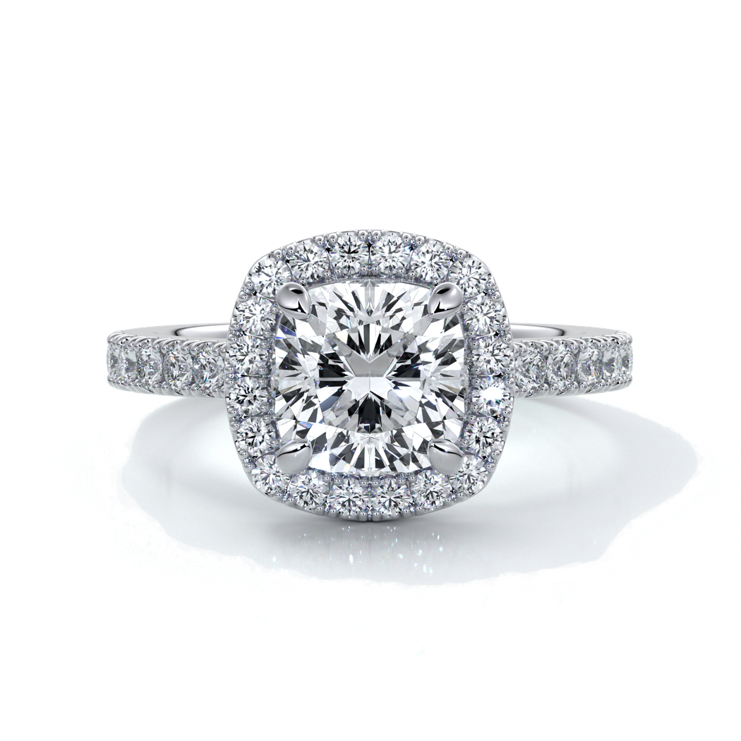 Platinum ring with a one point seven carat cushion cut diamond in a cathedral setting with a scalloped diamond band
