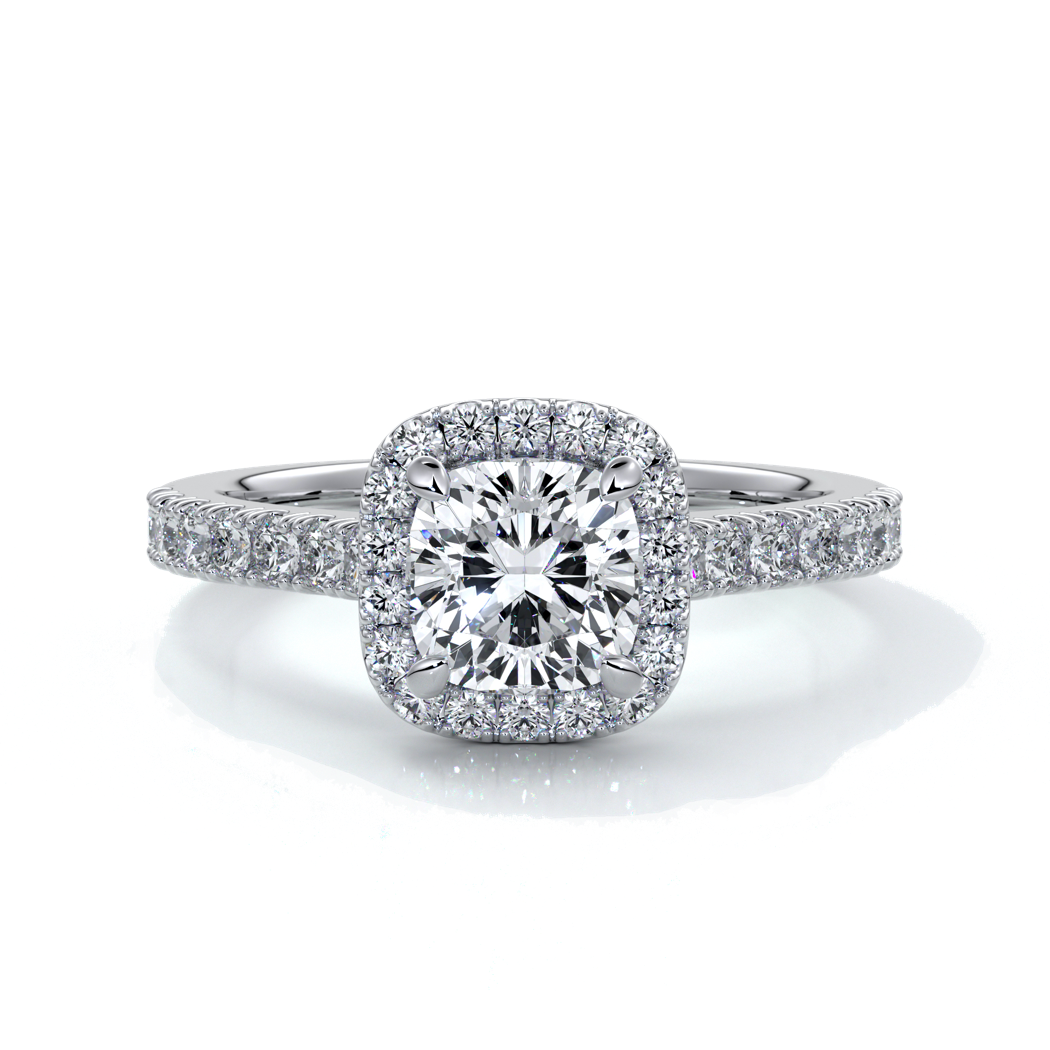 Platinum ring with one carat cushion cut diamond in a cathedral style setting with diamond detailing on the halo and shoulders