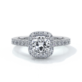 Platinum ring with one carat cushion cut diamond in a cathedral style setting with diamond detailing on the halo and shoulders