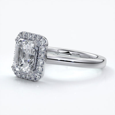 Emma Engagement ring emerald diamond halo cathedral platinum