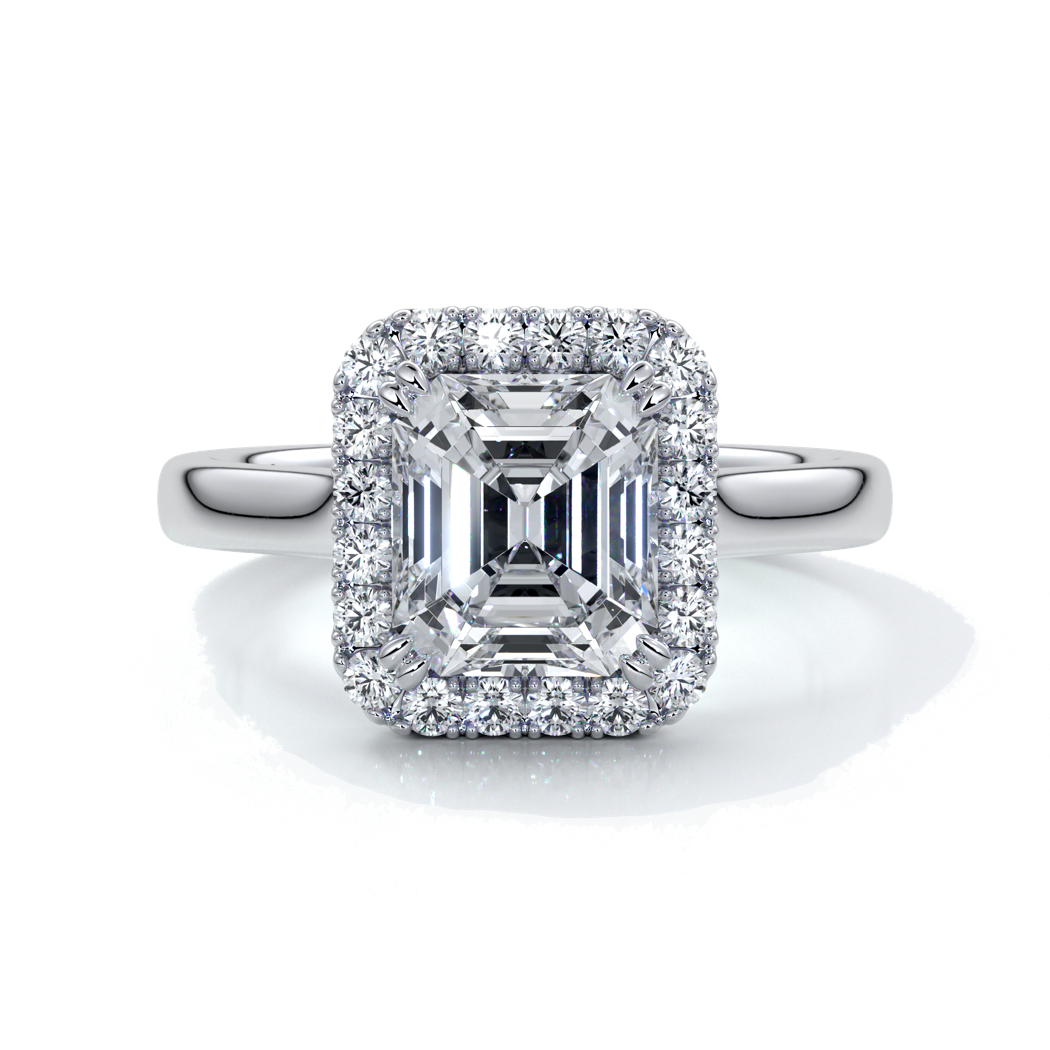 Platinum emerald cut diamond ring with a cathedral setting