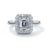 Platinum emerald cut diamond ring with a cathedral setting
