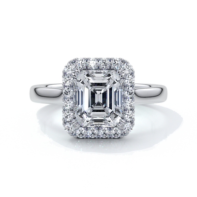 Platinum emerald cut diamond ring with a cathedral setting