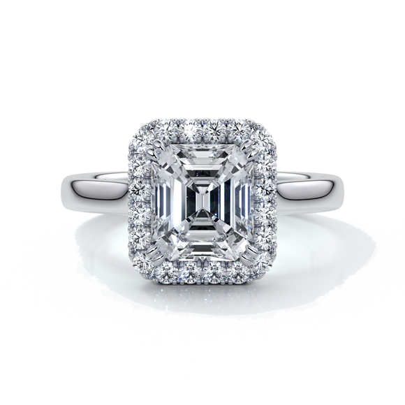Platinum emerald cut diamond ring with a cathedral setting