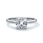 Platinum ring with two carat cushion cut diamond secured with four claws enhanced with a cathedral setting