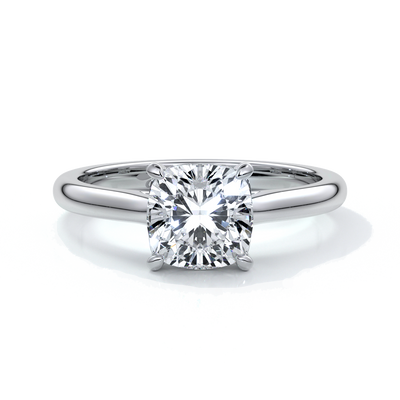 Platinum ring with two carat cushion cut diamond secured with four claws enhanced with a cathedral setting