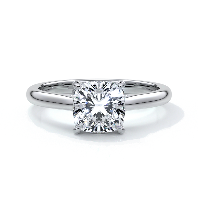Platinum ring with two carat cushion cut diamond secured with four claws enhanced with a cathedral setting