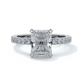 Platinum rig with a two carat radiant cut diamond with a scalloped diamond band