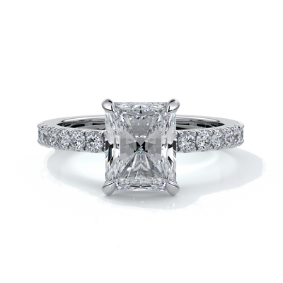 Platinum rig with a two carat radiant cut diamond with a scalloped diamond band