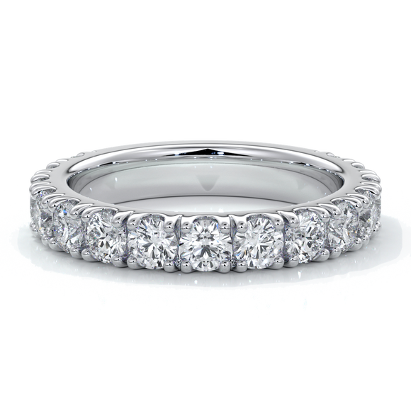 White gold women’s wedding ring with diamonds scalloped around the band.