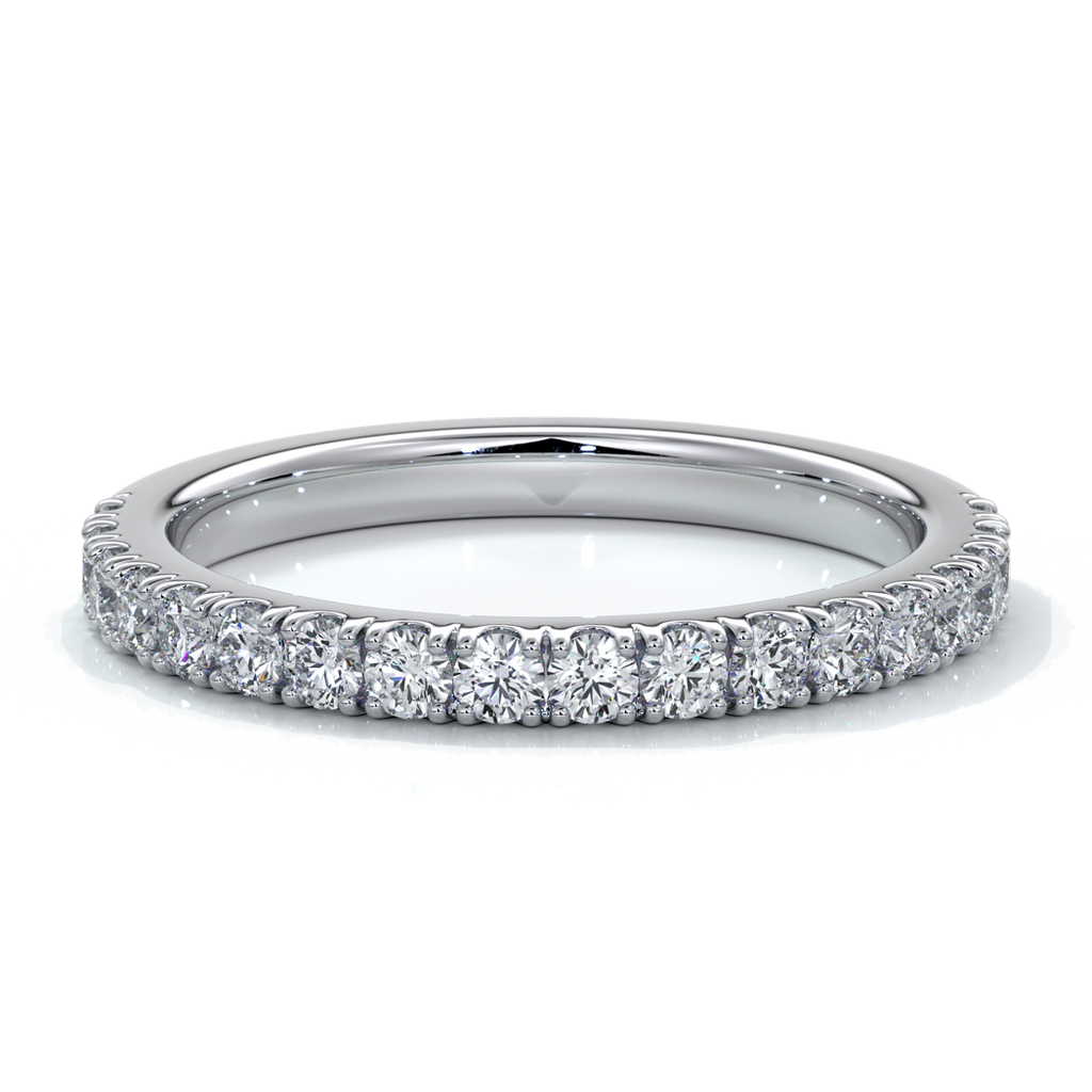 Platinum women’s wedding ring with 18mm scalloped diamonds around the band