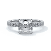Platinum ring with square emerald diamond secured with four claws and enhanced with a scalloped diamond band