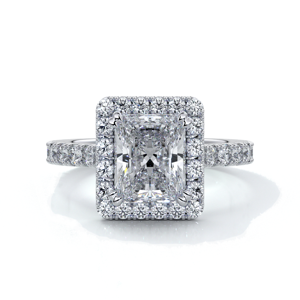 Platinum ring with a two carat radiant cut diamond in a cathedral and halo setting, with shoulder diamonds