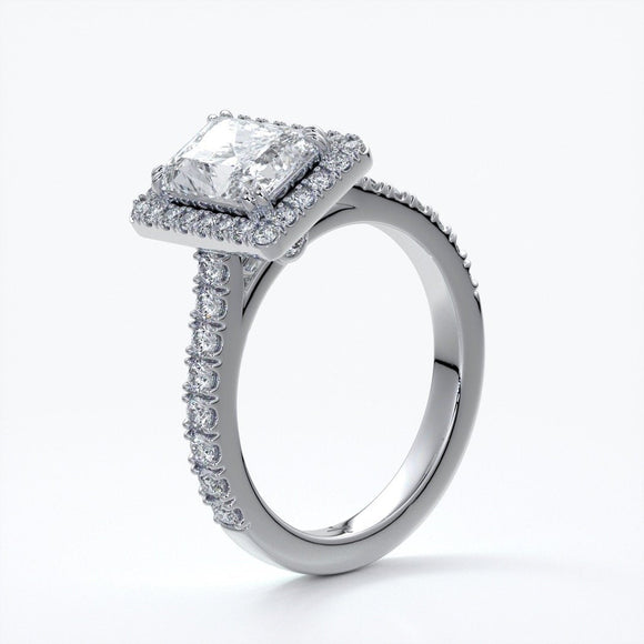 Iris Engagement Ring emerald diamond band halo