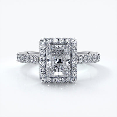 Iris Engagement Ring emerald diamond band halo