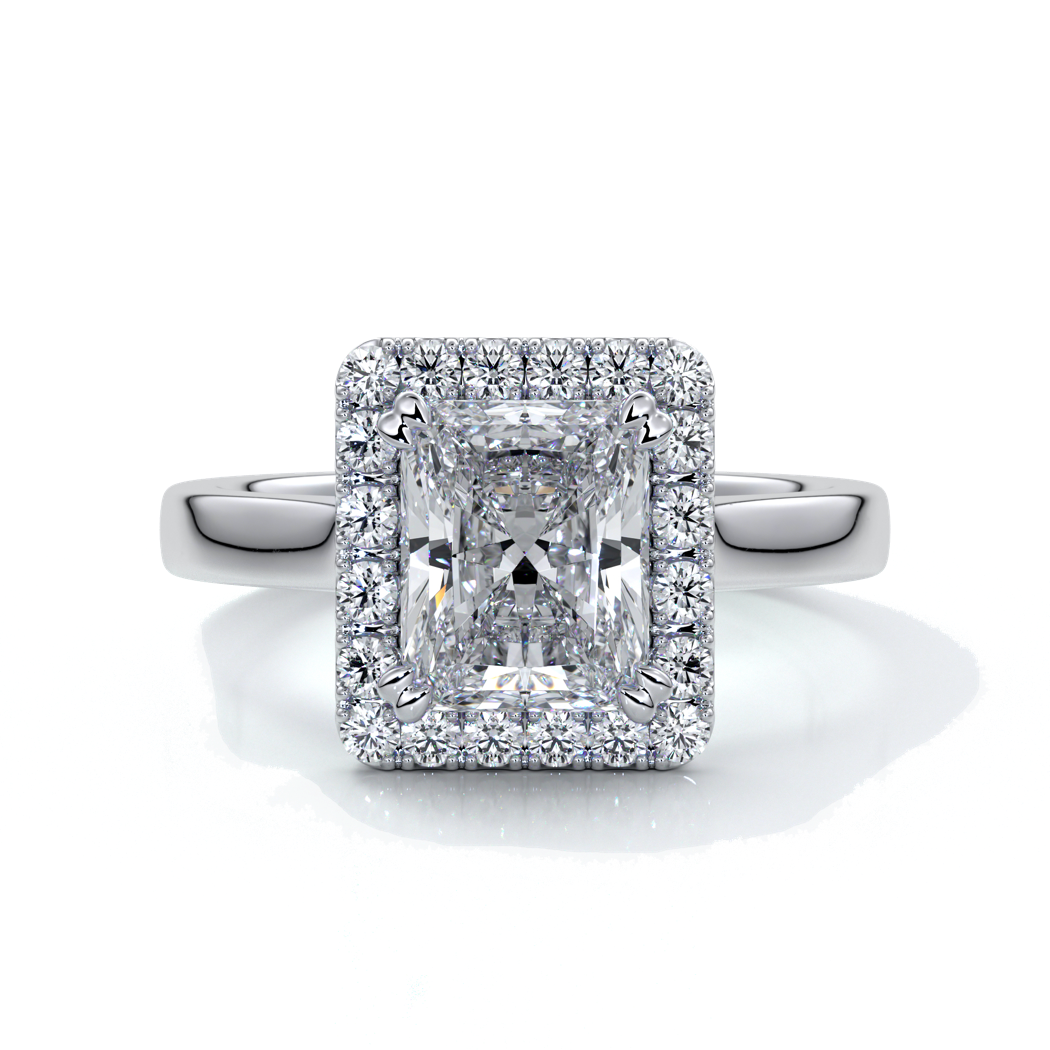 Platinum ring with a two carat radiant cut diamond with a cathedral and halo style setting