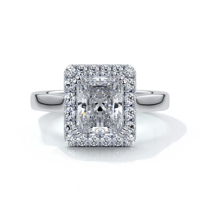 Platinum ring with a two carat radiant cut diamond with a cathedral and halo style setting