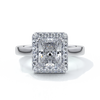 Platinum ring with a two carat radiant cut diamond with a cathedral and halo style setting