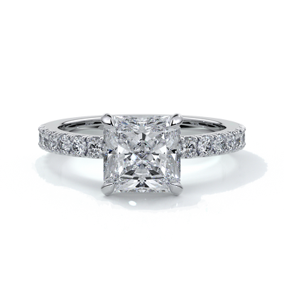 Platinum ring with a two carat square-cut radiant diamond enhanced with a scalloped diamond band