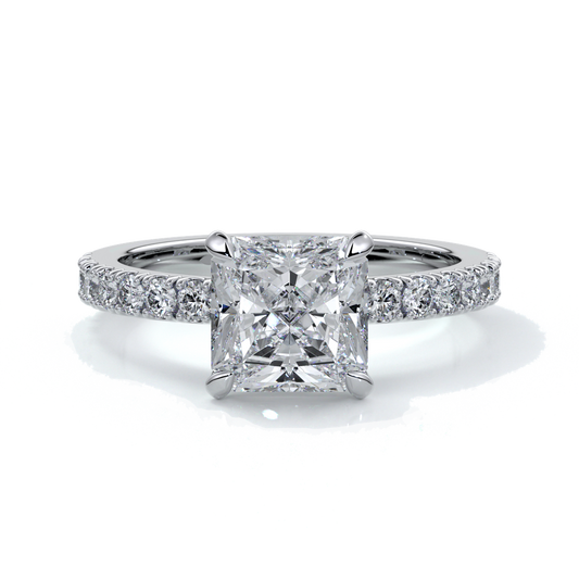 Platinum ring with a two carat square-cut radiant diamond enhanced with a scalloped diamond band