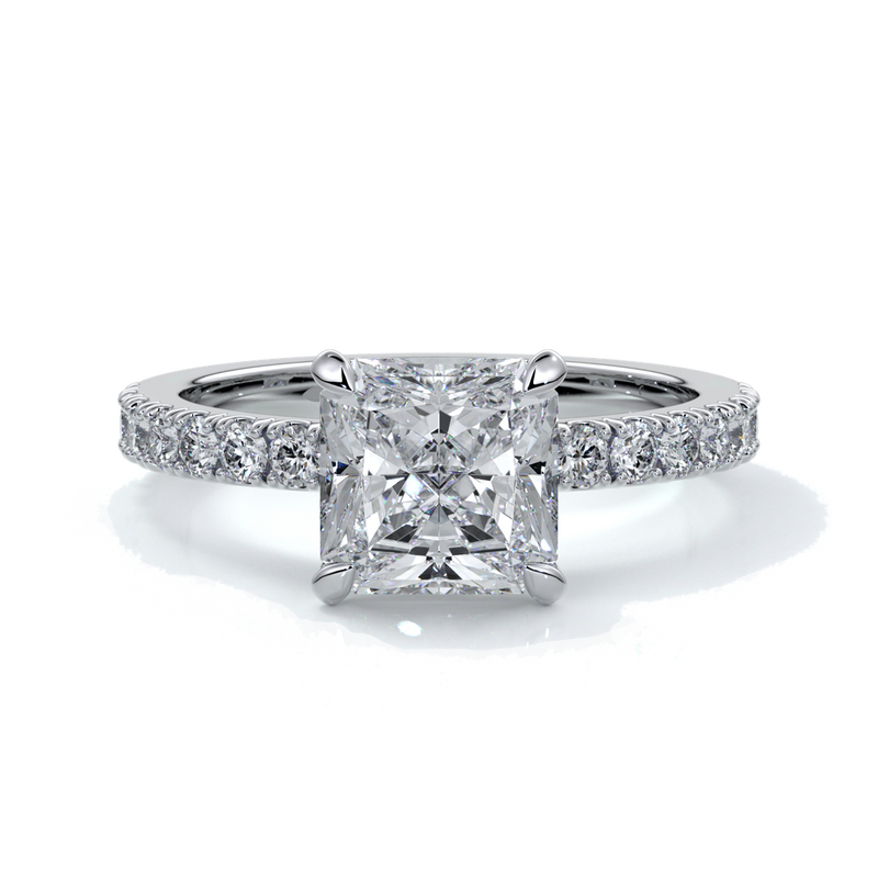 Platinum ring with a two carat square-cut radiant diamond enhanced with a scalloped diamond band
