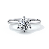 Platinum ring with two carat round diamond secured with six claws