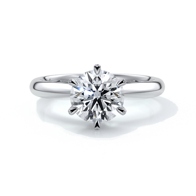 Platinum ring with two carat round diamond secured with six claws