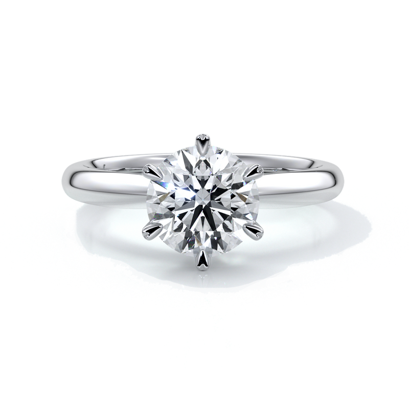 Platinum ring with two carat round diamond secured with six claws