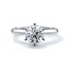 Platinum ring with two carat round diamond secured with six claws