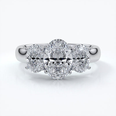 Lucida Engagement ring oval trilogy 4 claw cathedral 18ct white gold