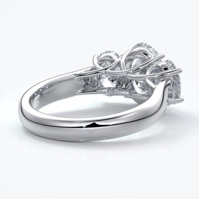 Lucida Engagement ring oval trilogy 4 claw cathedral 18ct white gold