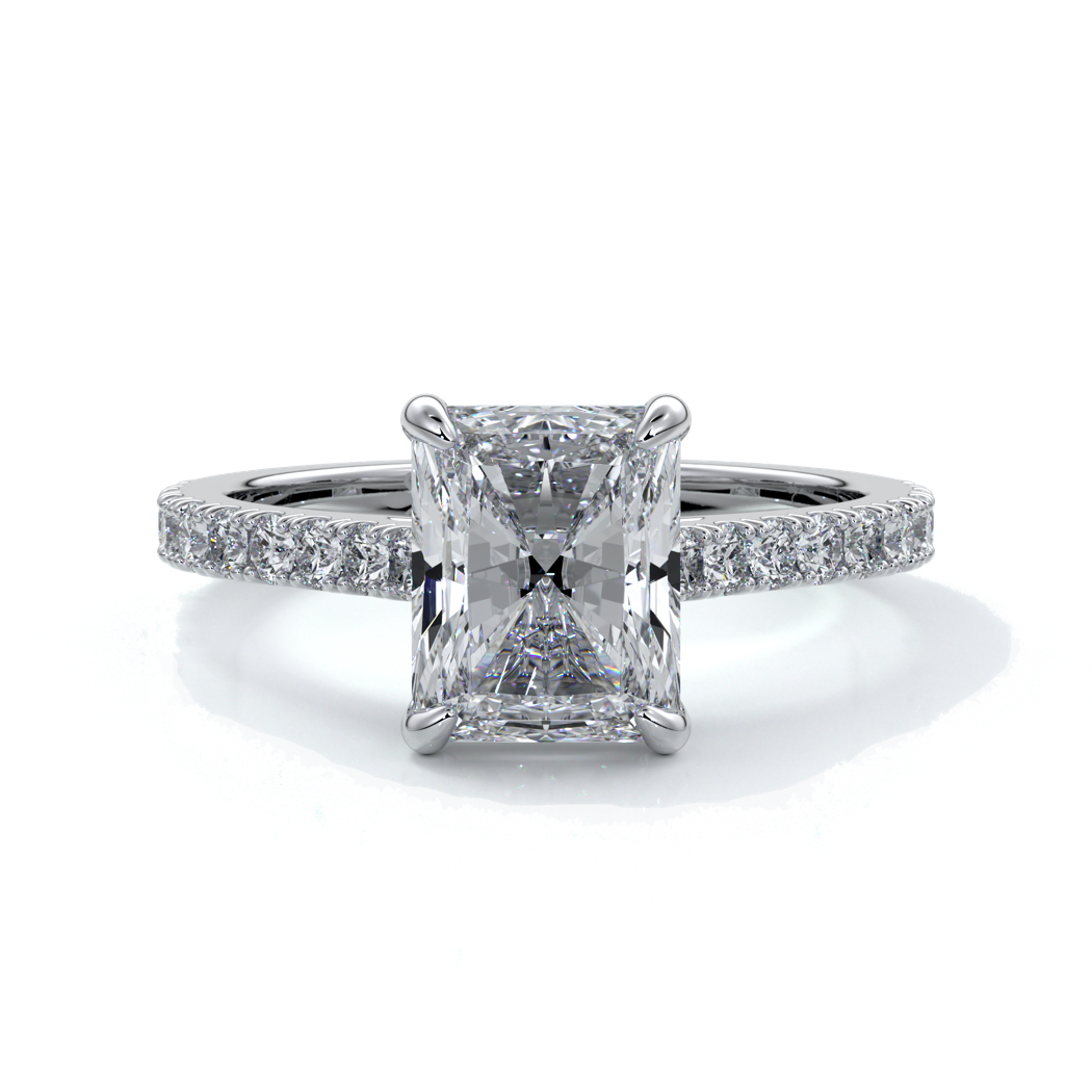 Platinum ring with a two carat radiant cut diamond enhanced in a cathedral setting with a scalloped diamond band