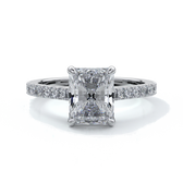 Platinum ring with a two carat radiant cut diamond enhanced in a cathedral setting with a scalloped diamond band