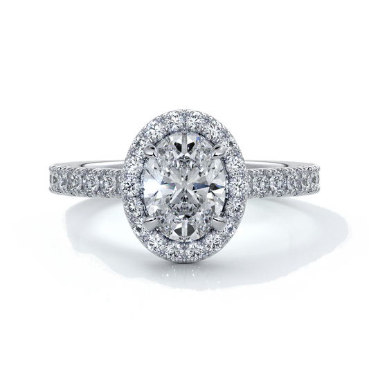 Platinum ring with one carat oval cut diamond in a cathedral style setting with scallop set shoulder diamonds and halo