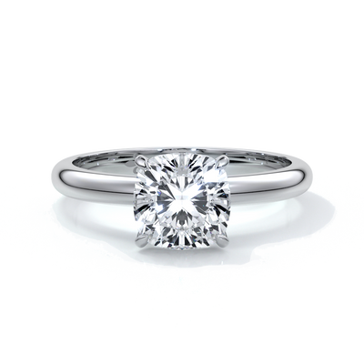 Platinum ring with a two carat cushion cut diamond secured in four claws