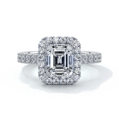 Platinum eighteen carat halo diamond ring, with cathedral setting in white gold