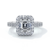 Platinum eighteen carat halo diamond ring, with cathedral setting in white gold