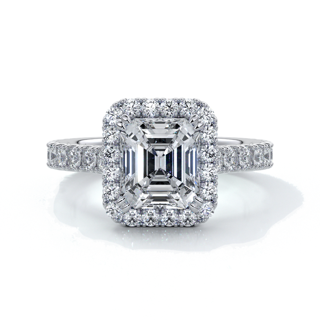 Platinum eighteen carat halo diamond ring, with cathedral setting in white gold