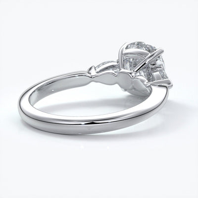 Sophie Engagement ring cushion cut trilogy pears cathedral platinum