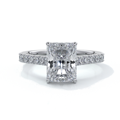 Ring with radiant cut diamond enhanced in a cathedral setting with a scalloped diamond band, cast in platinum
