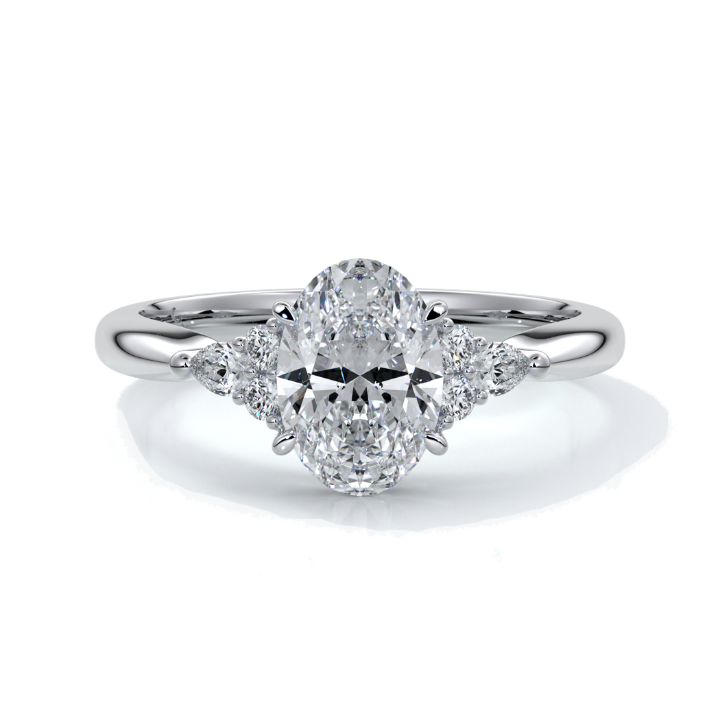 Platinum Engagement ring with trilogy style with smaller diamonds on either side