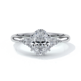 Platinum Engagement ring with trilogy style with smaller diamonds on either side