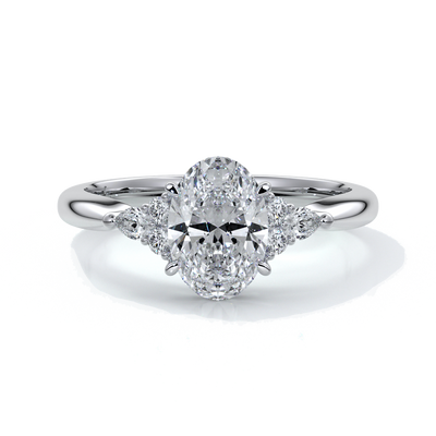 Platinum Engagement ring with trilogy style with smaller diamonds on either side