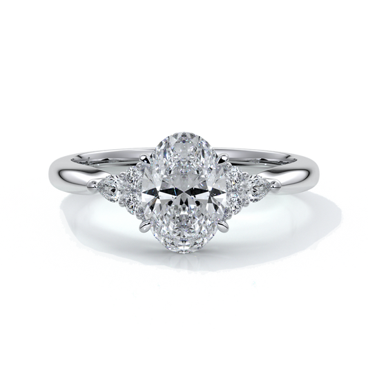 Platinum Engagement ring with trilogy style with smaller diamonds on either side